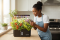 African American woman with hydroponic system